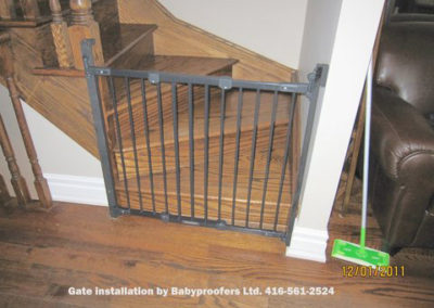 Typical baby gate installation between wall and post.